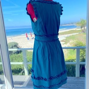 Turquoise dress with pockets. Designer quality.